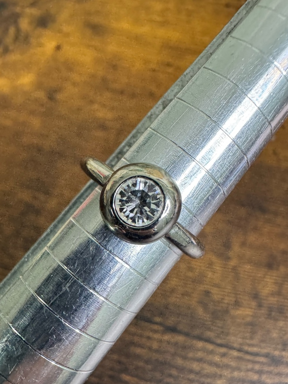 Coach Silver-Tone Ring with Clear Bezel Stone